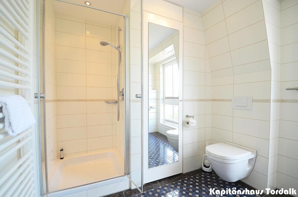 Kapitaenshaus Tordalk Mit 3 Schlafzimmern Holiday home Norderney