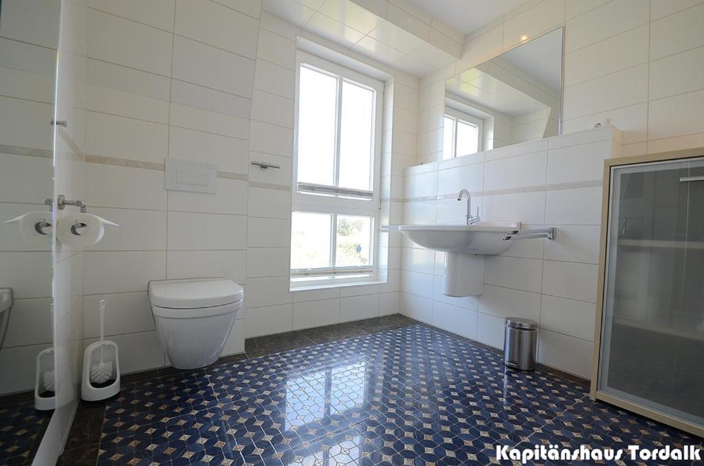 Kapitaenshaus Tordalk Mit 3 Schlafzimmern Holiday home *